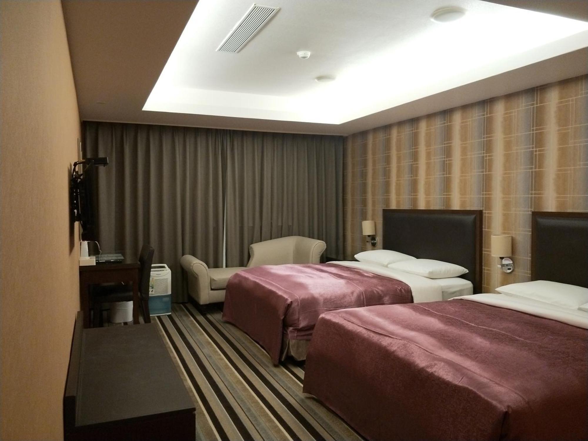 טאויואן Metropolis Hotel מראה חיצוני תמונה